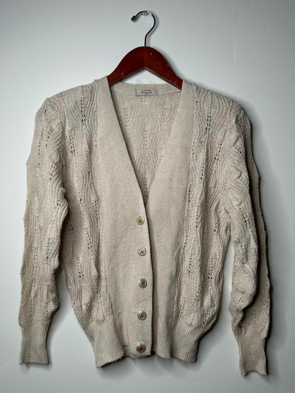 Cream cable knit cardigan with button-up front about a size medium